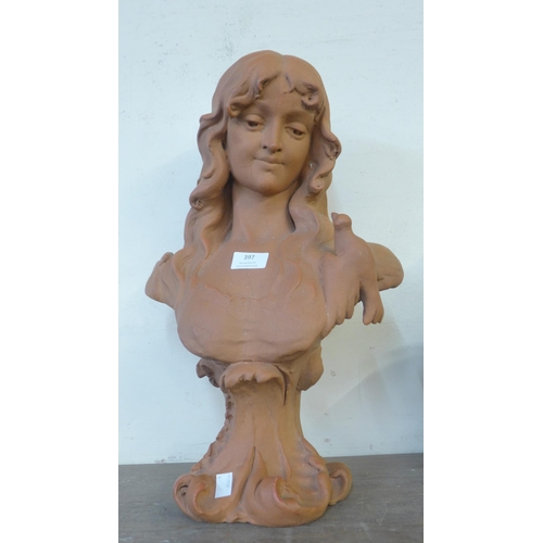 357 - An Art Nouveau style faux terracotta bust of a lady