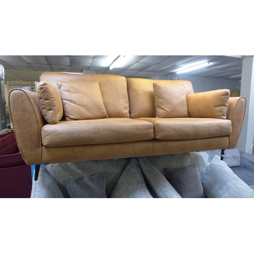 1386 - A vegan tan leather upholstered three seater sofa (some minor marks)