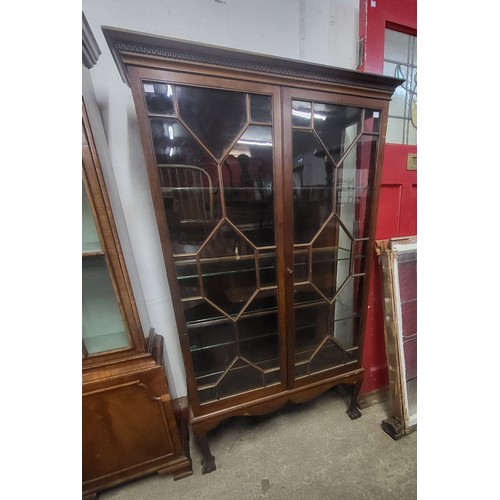 245B - An Edward VII mahogany display cabinet