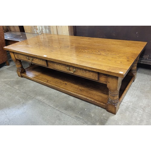 201 - A large oak two drawer coffee table