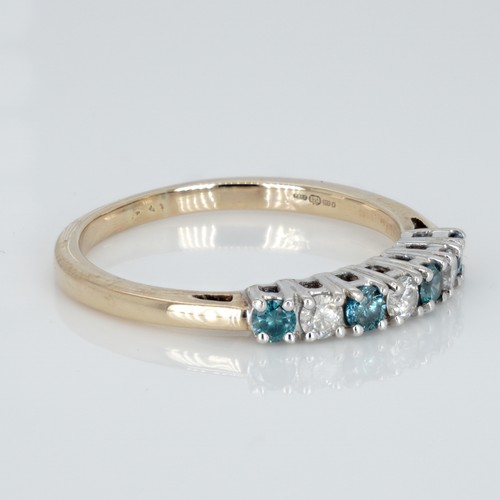 1039 - A 9ct gold seven stone two-colour diamond ring, 2.7g, S