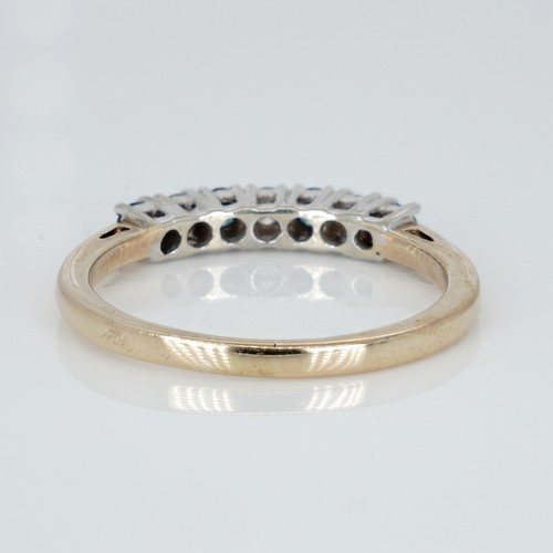 1039 - A 9ct gold seven stone two-colour diamond ring, 2.7g, S