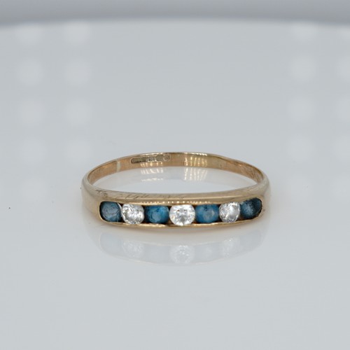 1040 - A 9ct gold, blue and white paste set ring, 1.5g, R