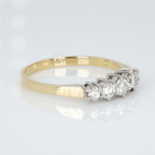 1050 - An 18ct gold and five stone diamond ring, 50pts marked on the shank, (0.5ct), ring size S, weight 3g