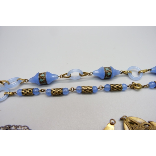 1000 - A Czech brooch, possibly by Neiger Brothers, a blue glass necklace and two pendants