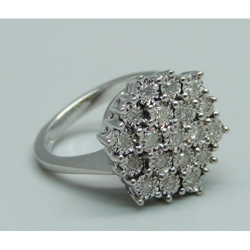 1014 - A 9ct white gold diamond cluster ring, L, 4.9g, with 19 brilliant cut diamonds