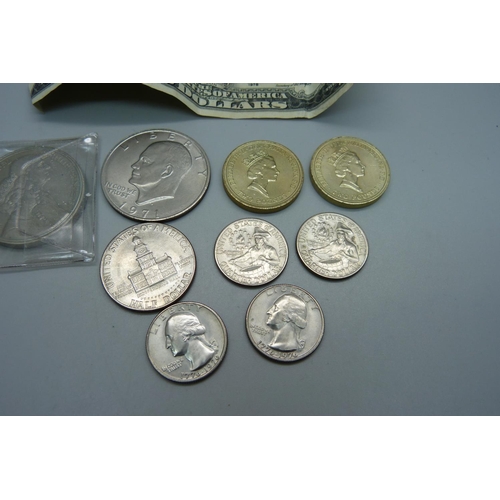 1029 - A Five Pounds coin, US coins including 1971 one dollar, half and quarter dollars, a two dollar note ... 