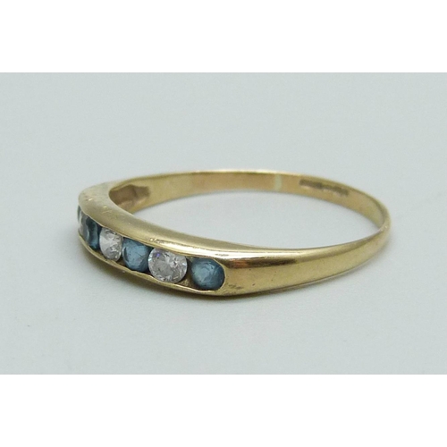 1040 - A 9ct gold, blue and white paste set ring, 1.5g, R