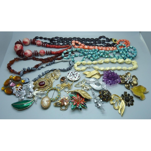 1063 - A collection of costume jewellery, necklaces and brooches