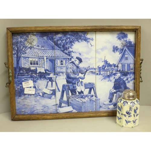 1076 - A blue and white Delft pot with a white metal top and a tiled Delft tray