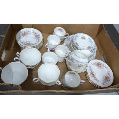 1087 - A Royal Albert Damask six setting tea service and a Royal Standard Rambling Rose tea service, lackin... 