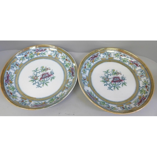 601 - A pair of Edge, Malkin & Co. chinoiserie style 19th Century dishes, 27cm