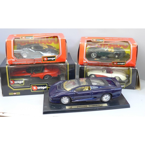 603 - Five Burago model vehicles, four boxed