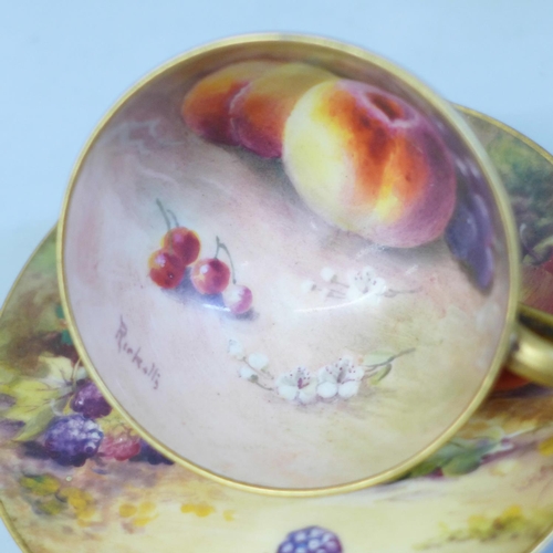 619 - A Royal Worcester miniature cup and saucer, hand painted with fruit, the cup signed Ricketts and the... 