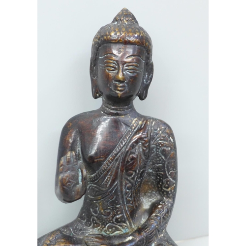 628 - A bronze Buddha, 19cm