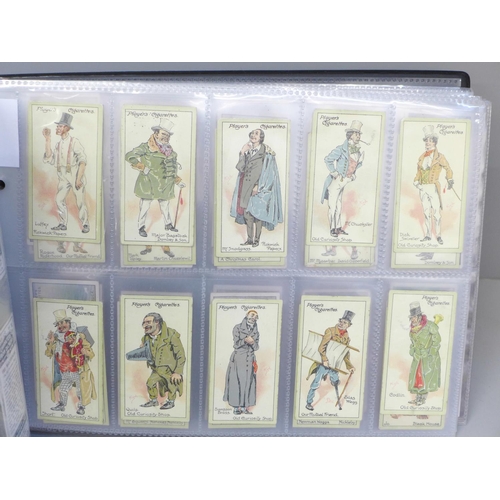 646 - An album of ten complete sets of cigarette cards, including Players (Cricketers 1930, Game Birds and... 