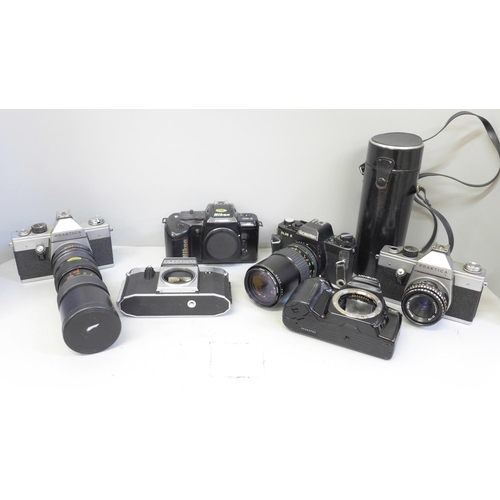 660 - Six 35mm cameras including Rolleiflex, Praktica, Minolta and Nikon