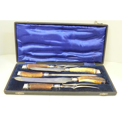 674 - An antler handled carving set, cased