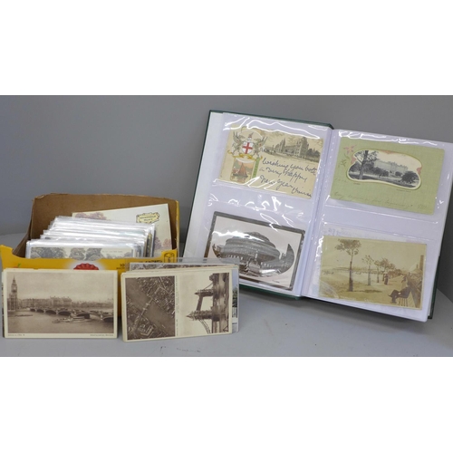 687 - A box of London and suburbs postcards with an album of 200 cards and a similar number loose