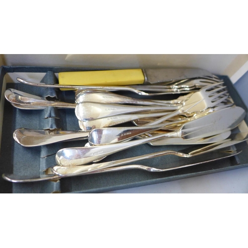 700 - A collection of plated flatware including a box of Walker & Hall fish servers, other plated cutlery ... 