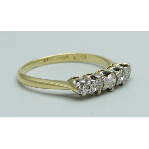 1013 - A 1970's 18ct gold and platinum set five stone diamond ring, P, 2.4g, 0.35cts of graduated diamonds