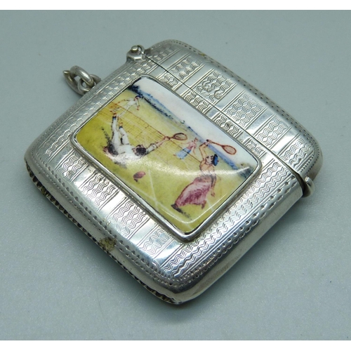 1028 - A silver vesta case with applied plaque with tennis scene, engine turned case, Birmingham 1906, 35g