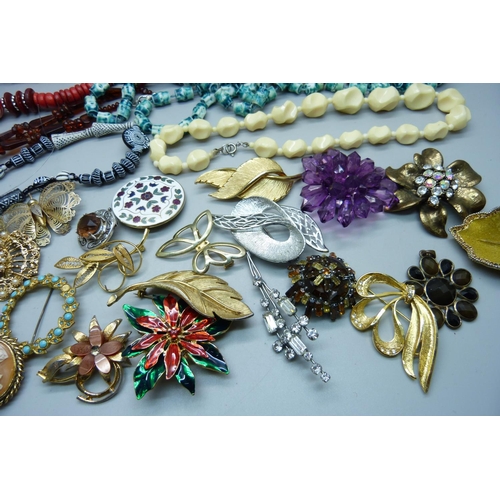 1063 - A collection of costume jewellery, necklaces and brooches