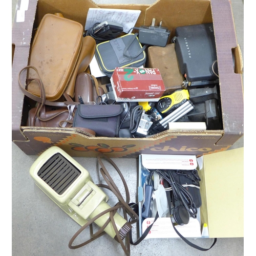 1125 - A box of cameras, a slide projector, camera accessories, etc. **PLEASE NOTE THIS LOT IS NOT ELIGIBLE... 