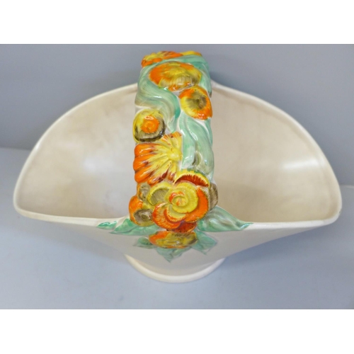 602 - A Clarice Cliff basket vase, a/f, chip to rim