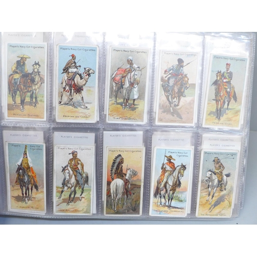 646 - An album of ten complete sets of cigarette cards, including Players (Cricketers 1930, Game Birds and... 