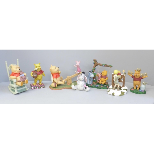 649 - A collection of Disney Winnie The Pooh figures (7)