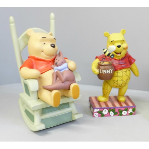 649 - A collection of Disney Winnie The Pooh figures (7)