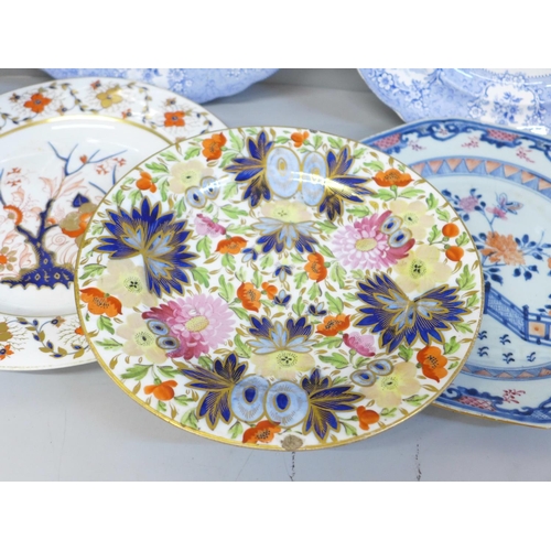 652 - An 18th Century Chinese porcelain plate, Crown Derby plate and creamware plate and two 19th Century ... 