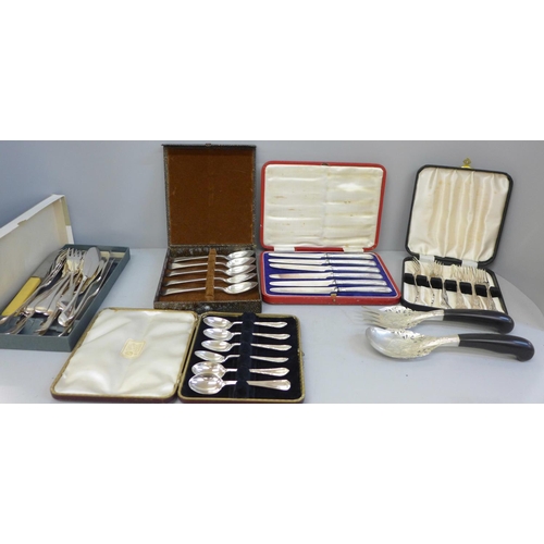 700 - A collection of plated flatware including a box of Walker & Hall fish servers, other plated cutlery ... 