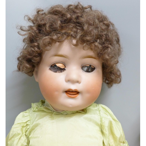 700D - A box of four vintage and modern dolls