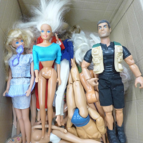 709 - A box of Barbie, Sindy and Action Man dolls