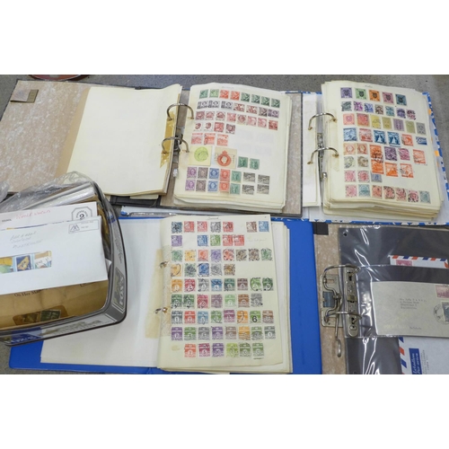 712 - stamps; an accumulation housed in four home made albums from Queen Victoria through to 1960's, with ... 