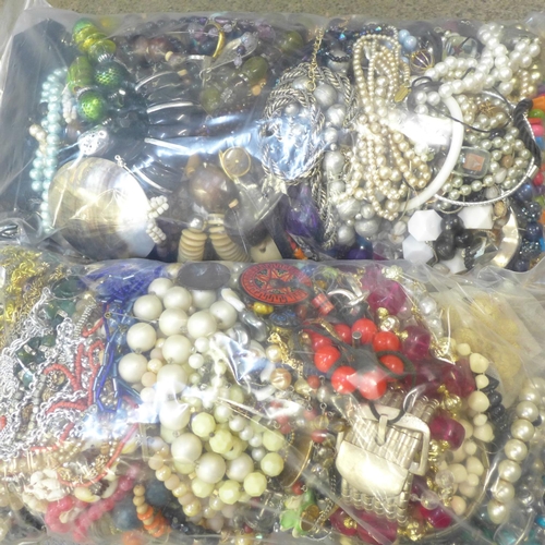 724 - Two bags of costume jewellery