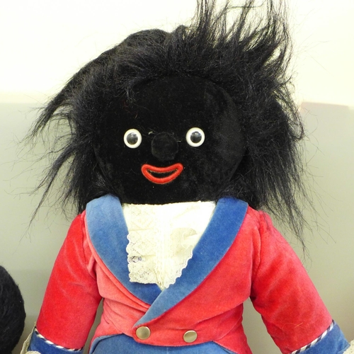 728 - Two soft toys and a black doll - (These items are listed on the basis they are illustrative of a byg... 