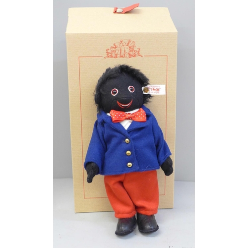 731 - A Steiff Golly Boy, boxed, ltd edition, white tag, 27cm - (These items are listed on the basis they ... 