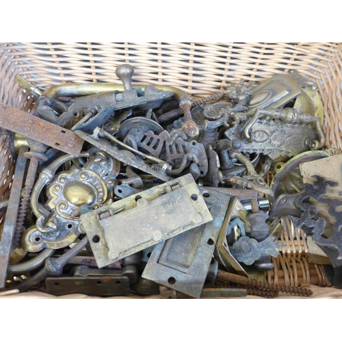 741 - A box of door furniture, brass escutcheons, lock, etc.