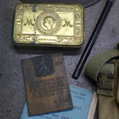 753 - A box of Army related items including two WWII helmets, 1914 Christmas tin, WWII bronze plaque, RAF ... 