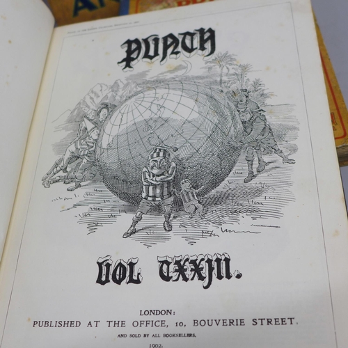 761 - Four bound volumes of Punch from 1902, 1905, 1912 and 1916 and three vintage annuals; The Prize, 192... 