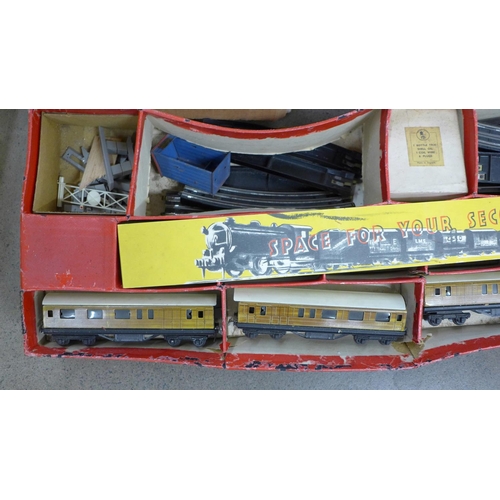 780 - A Fastlane Racing Extreme Challenge racing set, a Twin Trix Railway 00 gauge train set, boxed and ot... 