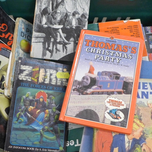 784 - A collection of books including Britain in pictures, motoring related books, annuals, children's boo... 