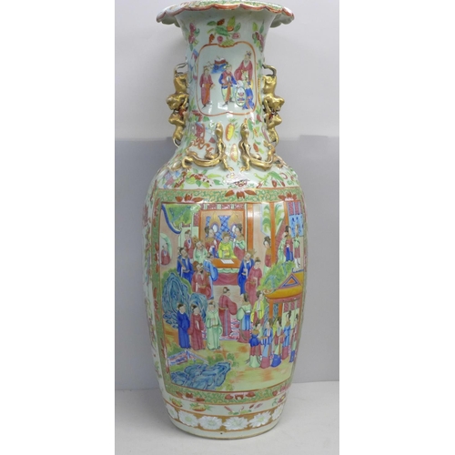 786 - A 19th Century Chinese export famille rose baluster vase, decorated with panels of enamelled figures... 