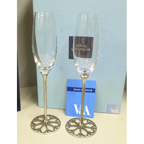 795 - A pair of Royal Selangor The Victoria and Albert Museum champagne flutes, boxed, 28cm