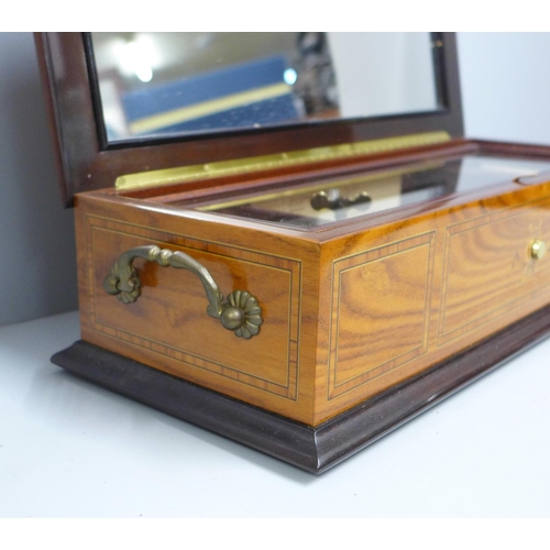 803 - A late 20th Century Franklin Mint Johann Strauss inlaid music box, (not in working order)