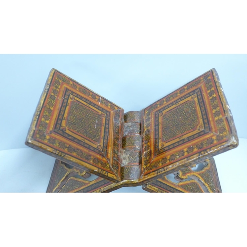 805 - A Quran book stand and an empty Japanese photograph album