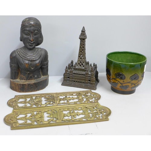 807 - A cast model Blackpool Tower money box, a carved bust, possibly Indian, a pair of pierced brass door... 